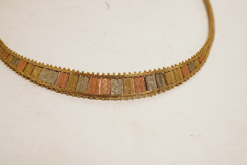 A modern tri-coloured 9ct gold necklace and matching bracelet, 16.5 grams. Condition - fair to good